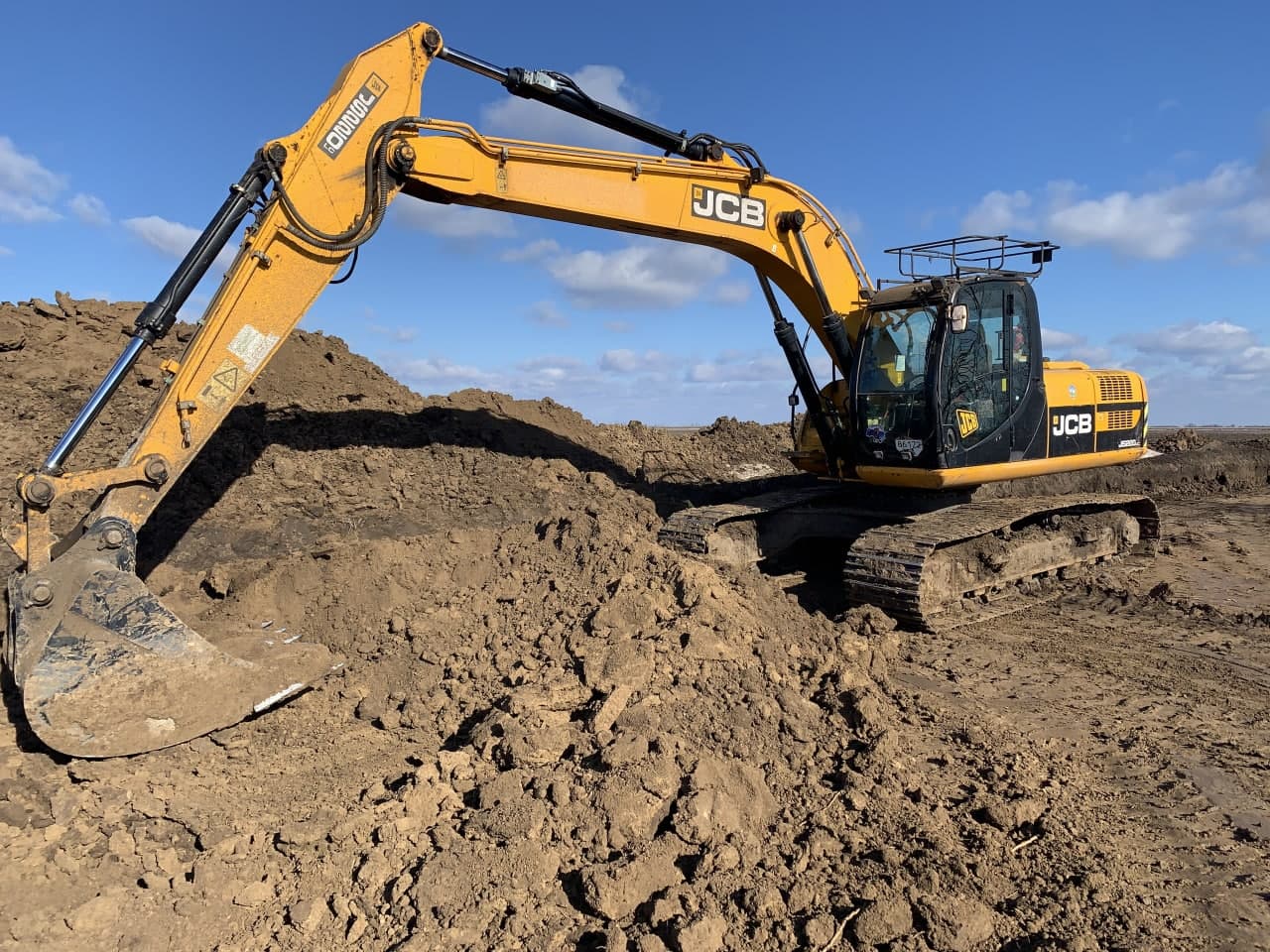 Послуги екскаватора JCB 220